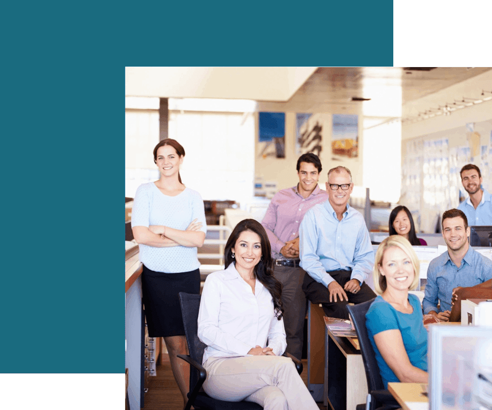 A group of people sitting in an office.