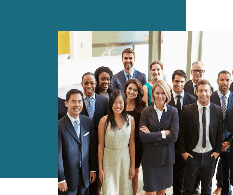 A group of people in business attire posing for the camera.